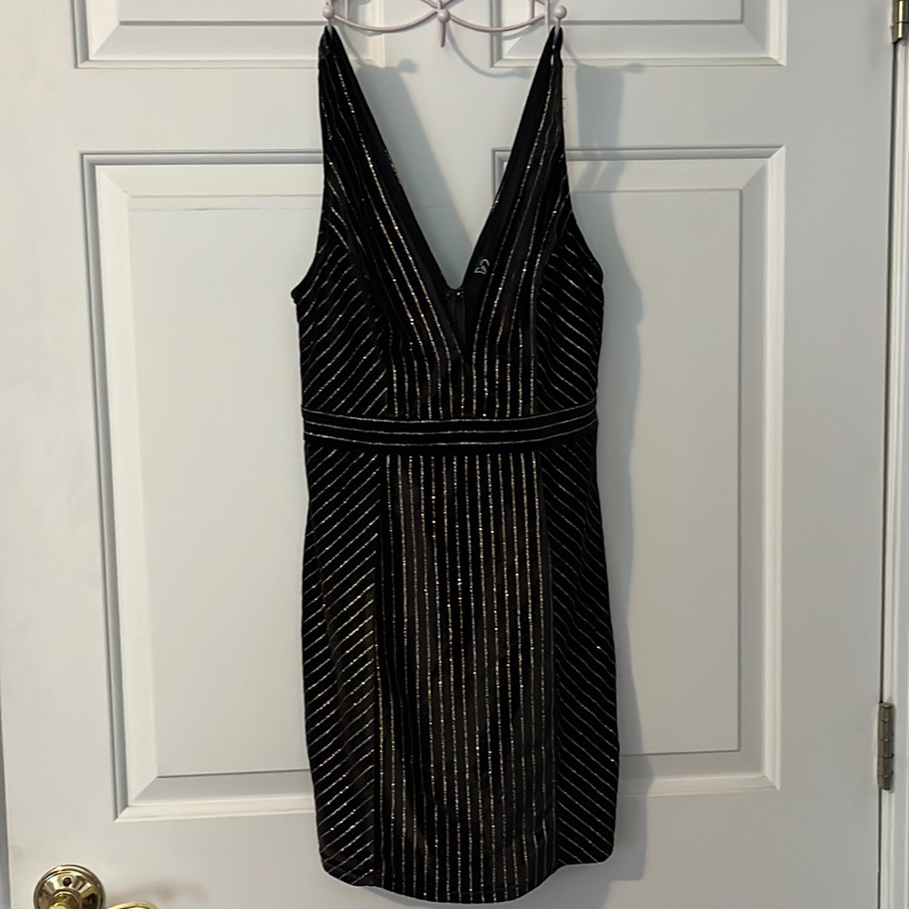 black dress with gold detail